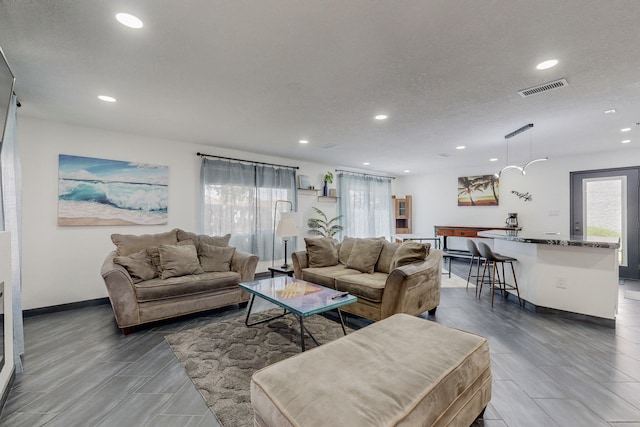 7218 Whippoorwill Ln NE, Albuquerque, NM 87109 - living room with visible vents, recessed lighting, and baseboards