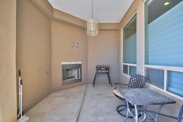 7408 Molas Rd NW, Albuquerque, NM 87114 - view of patio featuring a fireplace
