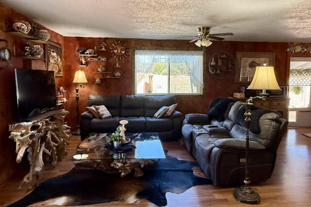 10 Cliffside Dr, Ramah, NM 87321 - living room with ceiling fan, a textured ceiling, and wood finished floors