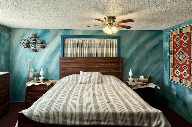 10 Cliffside Dr, Ramah, NM 87321 - bedroom with a textured ceiling, wallpapered walls, and ceiling fan