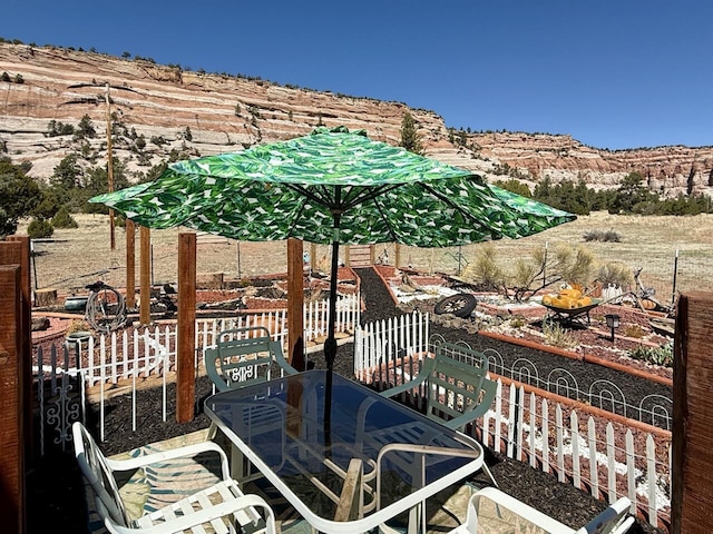 10 Cliffside Dr, Ramah, NM 87321 - deck featuring fence and a mountain view