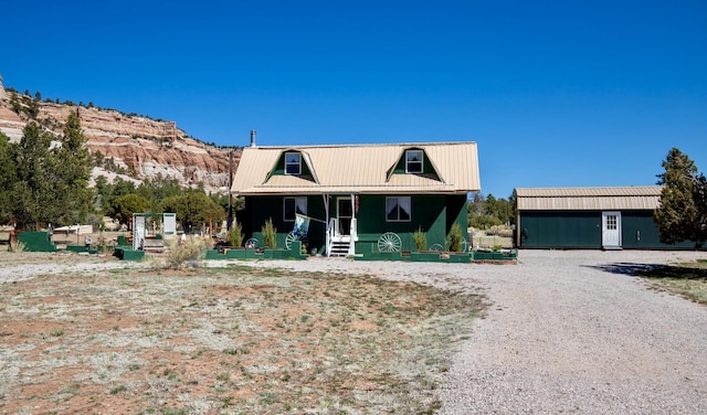 10 Cliffside Dr, Ramah, NM 87321 - view of front facade featuring a porch and metal roof