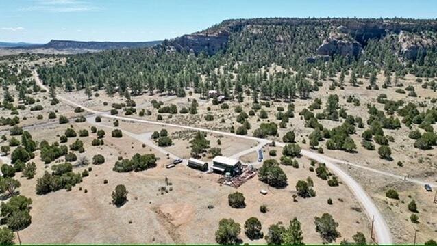 10 Cliffside Dr, Ramah, NM 87321 - birds eye view of property with a rural view, a mountain view, and view of desert