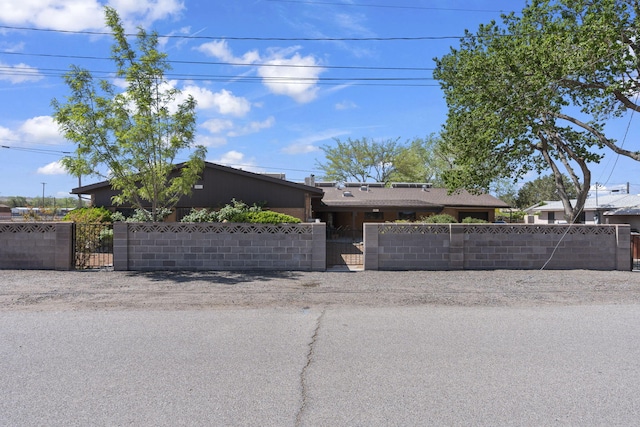 view of front of home with a gate and a fenced front yard