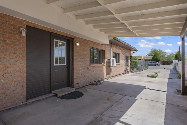 view of patio featuring fence