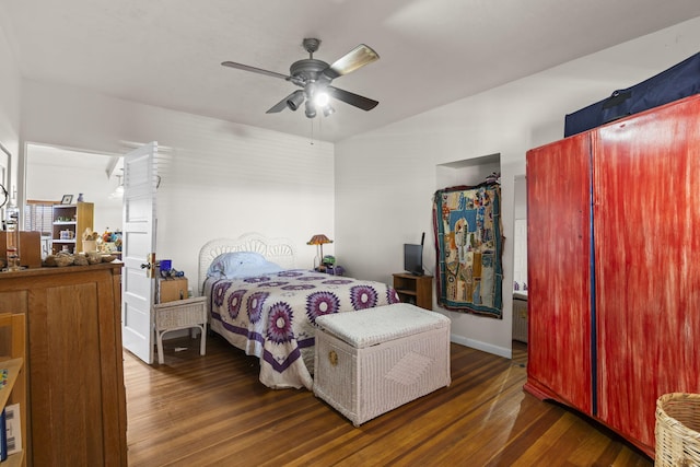 bedroom featuring ceiling fan and wood finished floors