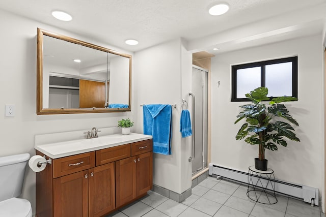 full bath with tile patterned flooring, vanity, toilet, a baseboard radiator, and a stall shower