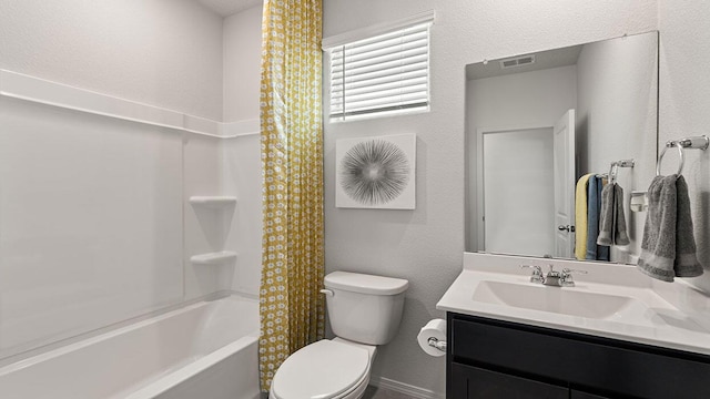 full bath with toilet, visible vents, shower / tub combo with curtain, and vanity
