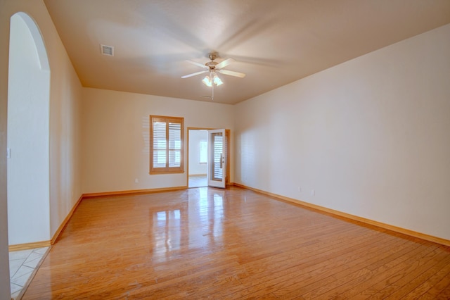 3728 Spyglass Loop SE, Rio Rancho, NM 87124 - unfurnished room with baseboards, visible vents, light wood-style flooring, and ceiling fan