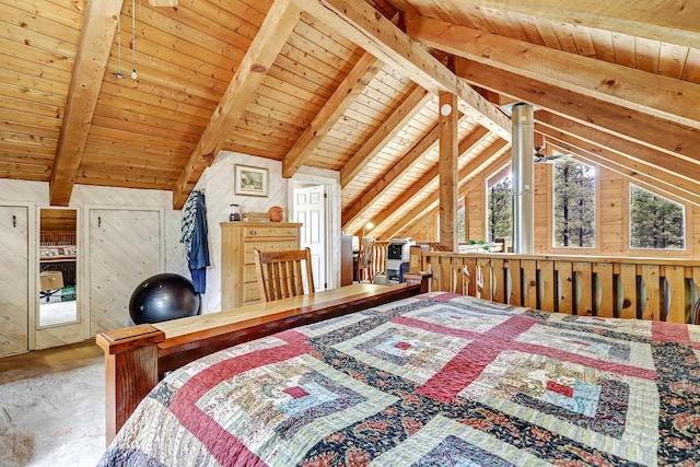 bedroom with wood ceiling, vaulted ceiling with beams, wood walls, and carpet floors