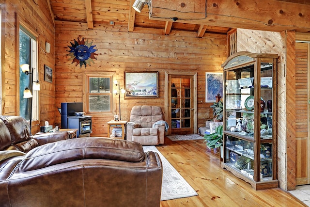 living area featuring wood walls and wood ceiling