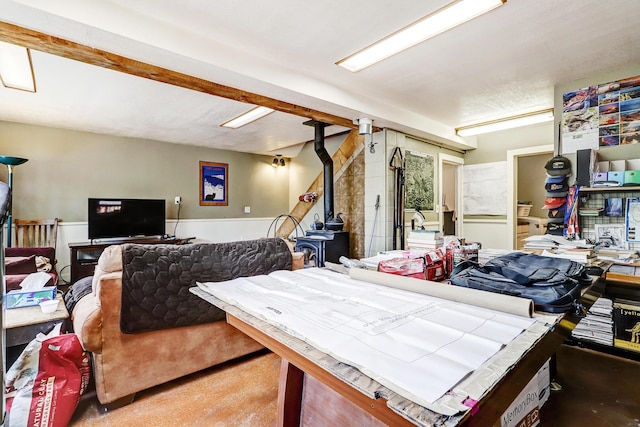 dining room featuring a wood stove