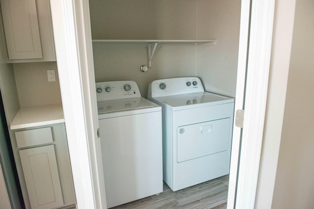 washroom with laundry area and washing machine and clothes dryer