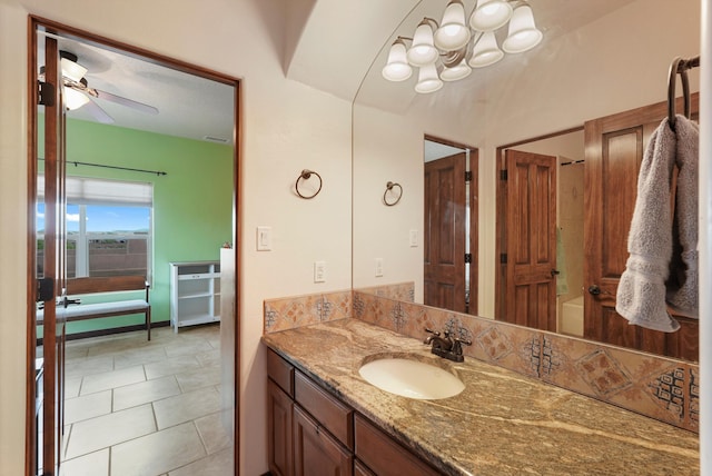 3101 Rachel Ct NE, Rio Rancho, NM 87144 - bathroom with ceiling fan, vanity, and tile patterned floors