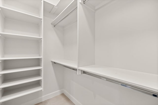 1232 21st Ave SE, Rio Rancho, NM 87124 - spacious closet featuring light tile patterned floors