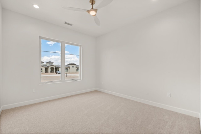 1232 21st Ave SE, Rio Rancho, NM 87124 - empty room featuring baseboards, a ceiling fan, visible vents, and light carpet
