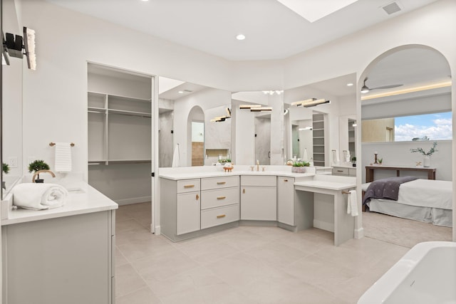 1232 21st Ave SE, Rio Rancho, NM 87124 - bathroom with walk in shower, visible vents, a sink, and recessed lighting
