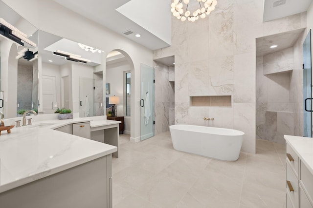 1232 21st Ave SE, Rio Rancho, NM 87124 - bathroom with a freestanding tub, tile walls, a shower stall, vanity, and marble finish floor