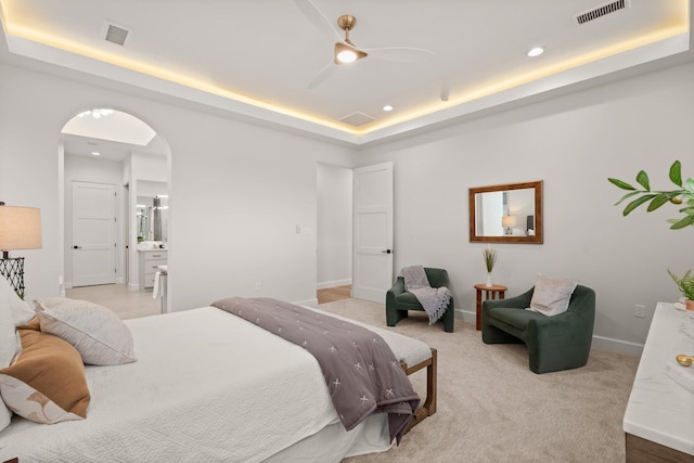 1232 21st Ave SE, Rio Rancho, NM 87124 - bedroom featuring visible vents, arched walkways, a raised ceiling, and baseboards