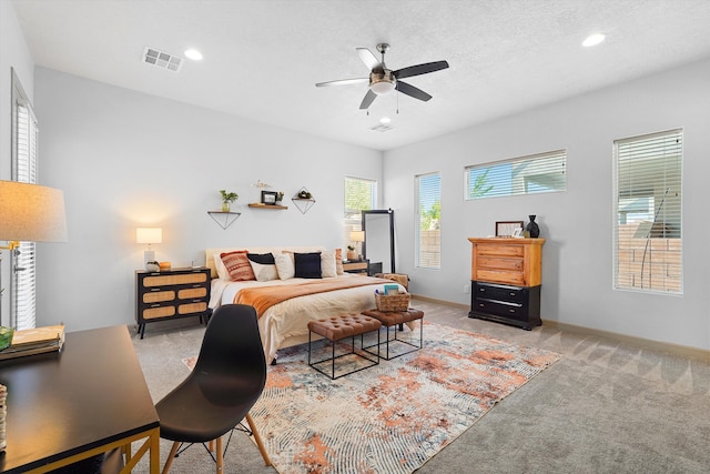 bedroom with recessed lighting, baseboards, visible vents, and light carpet