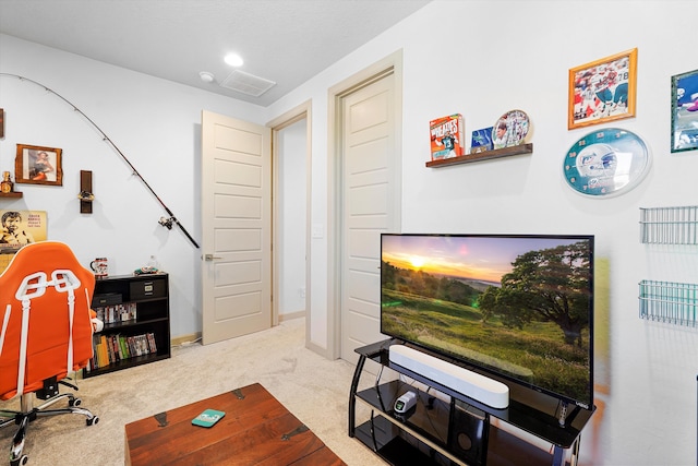 office space featuring visible vents, carpet, and baseboards