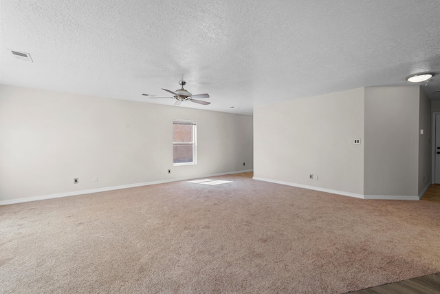 7700 Briar Ridge Ave NW, Albuquerque, NM 87114 - unfurnished room featuring a ceiling fan, a textured ceiling, and baseboards