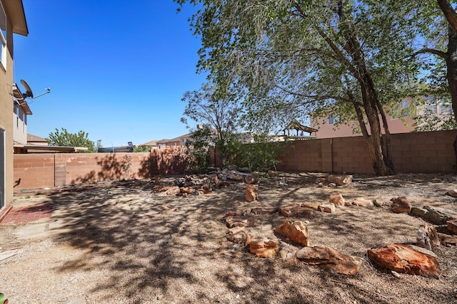 7700 Briar Ridge Ave NW, Albuquerque, NM 87114 - view of yard featuring a fenced backyard