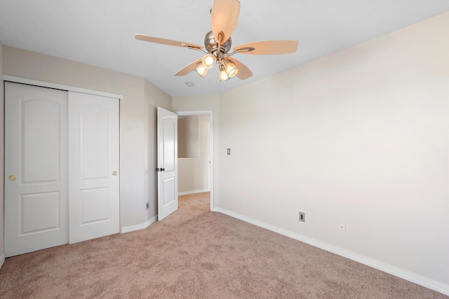7700 Briar Ridge Ave NW, Albuquerque, NM 87114 - unfurnished bedroom with a ceiling fan, baseboards, carpet, and a closet