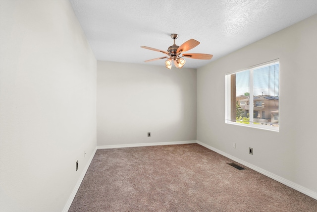 7700 Briar Ridge Ave NW, Albuquerque, NM 87114 - empty room with a ceiling fan, a textured ceiling, visible vents, baseboards, and carpet