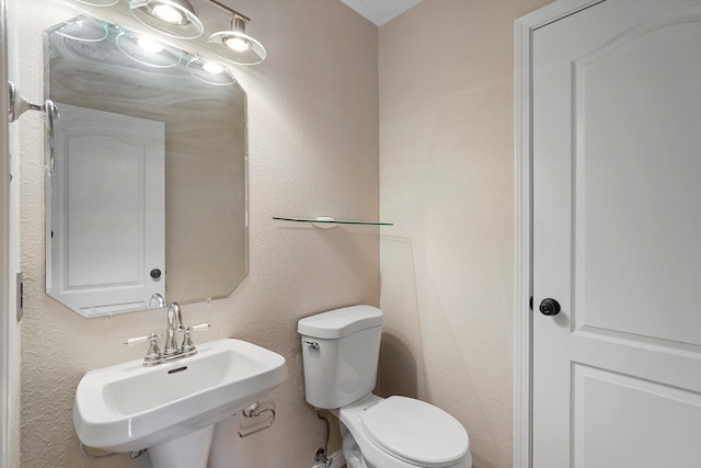 7700 Briar Ridge Ave NW, Albuquerque, NM 87114 - bathroom with a sink and toilet
