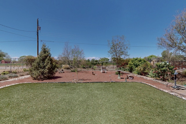 view of yard with fence