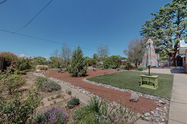 view of yard featuring fence