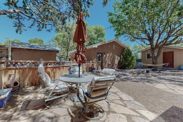 5 Hobbs Rd, Peralta, NM 87042 - view of patio / terrace featuring fence and outdoor dining space