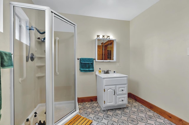 5 Hobbs Rd, Peralta, NM 87042 - bathroom with baseboards, vanity, and a shower stall