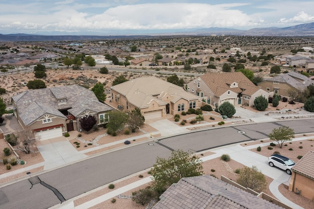 2413 Desert View Rd NE, Rio Rancho, NM 87144 - aerial view of residential area with a mountain backdrop