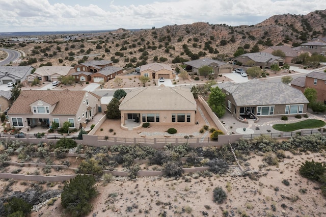 2413 Desert View Rd NE, Rio Rancho, NM 87144 - aerial perspective of suburban area featuring a mountain backdrop