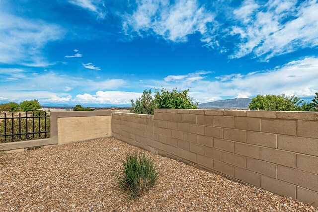 2413 Desert View Rd NE, Rio Rancho, NM 87144 - view of yard featuring fence