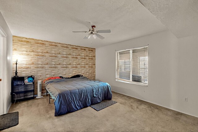 5401 Crown Ridge Rd NW, Albuquerque, NM 87114 - carpeted bedroom with a textured ceiling, a ceiling fan, and baseboards