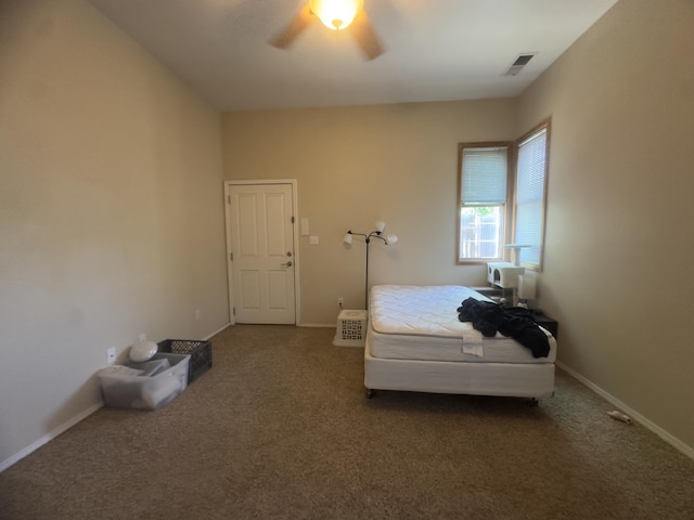 bedroom featuring baseboards, ceiling fan, carpet, and visible vents