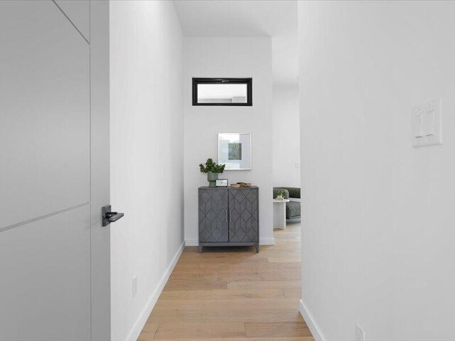 19 Anasazi Trl, Sandia Park, NM 87047 - corridor featuring baseboards and light wood-style flooring