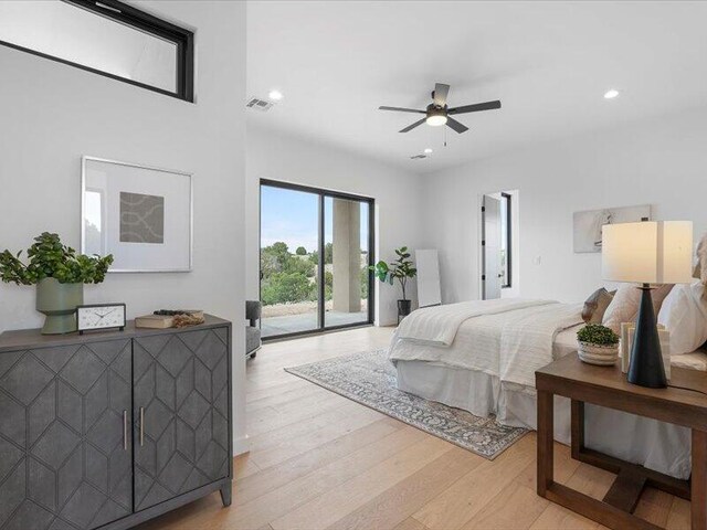 19 Anasazi Trl, Sandia Park, NM 87047 - bedroom with recessed lighting, access to outside, light wood finished floors, and visible vents