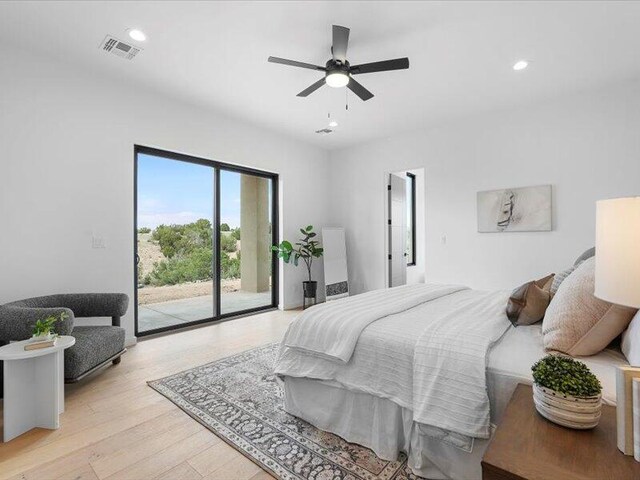 19 Anasazi Trl, Sandia Park, NM 87047 - bedroom featuring access to outside, visible vents, light wood-style flooring, and recessed lighting