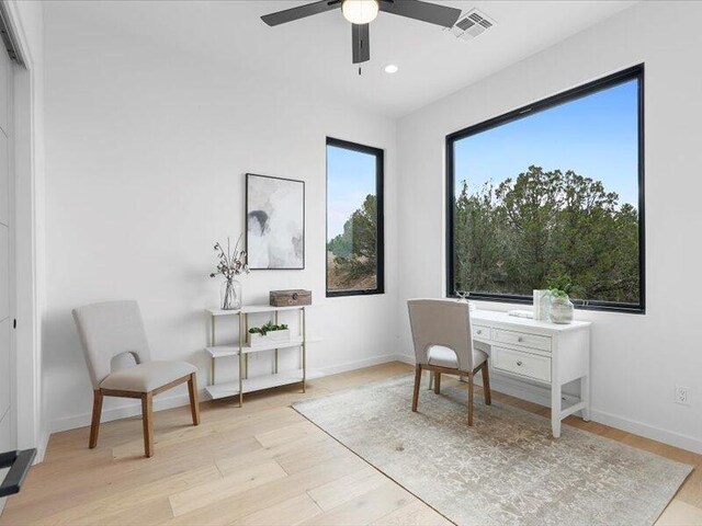 19 Anasazi Trl, Sandia Park, NM 87047 - living area with light wood-style floors, ceiling fan, recessed lighting, and visible vents