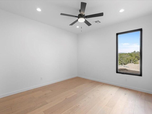 19 Anasazi Trl, Sandia Park, NM 87047 - unfurnished room with visible vents, recessed lighting, light wood-style floors, and baseboards