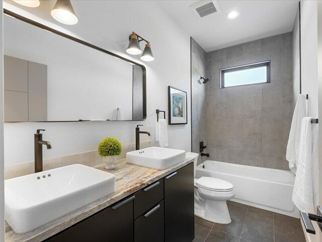 19 Anasazi Trl, Sandia Park, NM 87047 - bathroom with visible vents, a sink, tile patterned flooring, and  shower combination