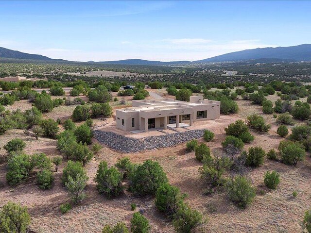 19 Anasazi Trl, Sandia Park, NM 87047 - birds eye view of property with a mountain view