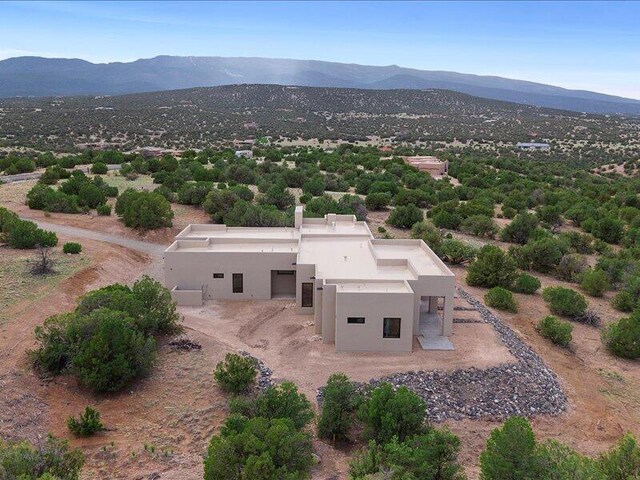 19 Anasazi Trl, Sandia Park, NM 87047 - birds eye view of property with a mountain view