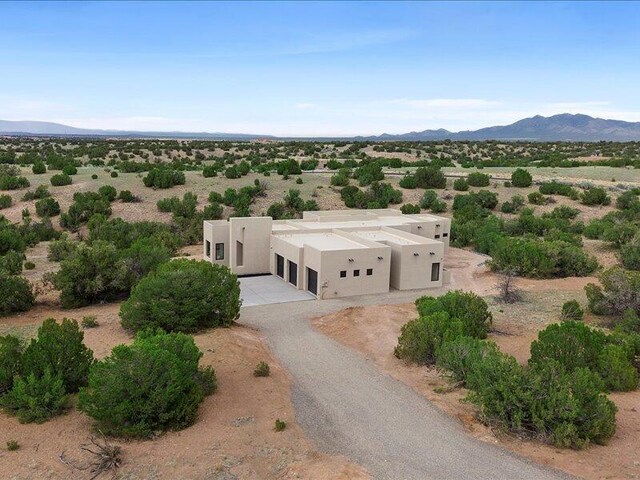 19 Anasazi Trl, Sandia Park, NM 87047 - aerial view featuring a mountain view and a rural view