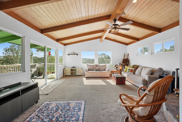 living area featuring carpet floors, plenty of natural light, lofted ceiling with beams, and wood ceiling