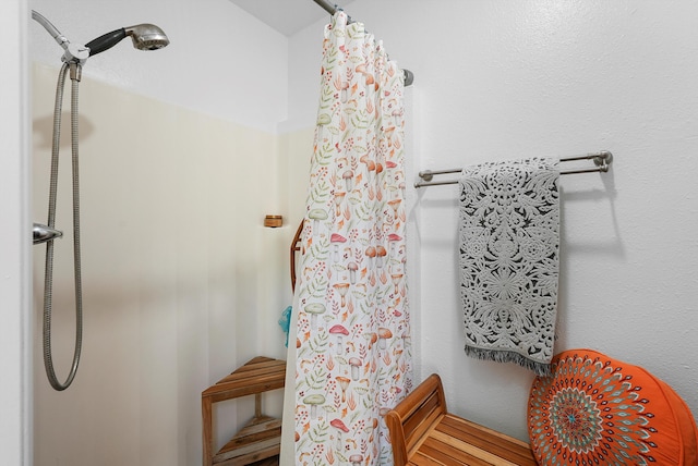 full bath with a shower with shower curtain